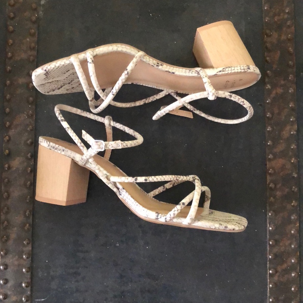 Brand new. Size 9 snake skin sandal.